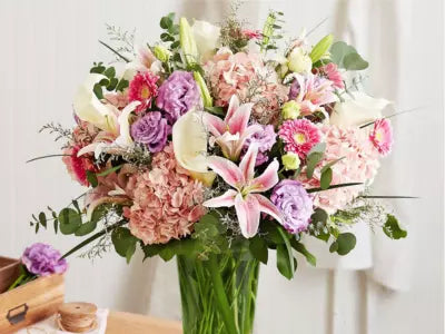 Calla Lily Mother's Day Bouquet with light pink hydrangea, lavender lisianthus, spiral eucalyptus