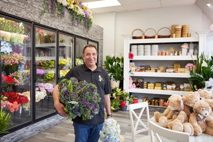 George Karatzas in the James Cress Florist shop in Smithtown