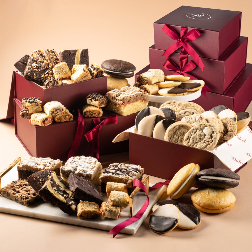 A gourmet gift basket with cheese, crackers and sweets