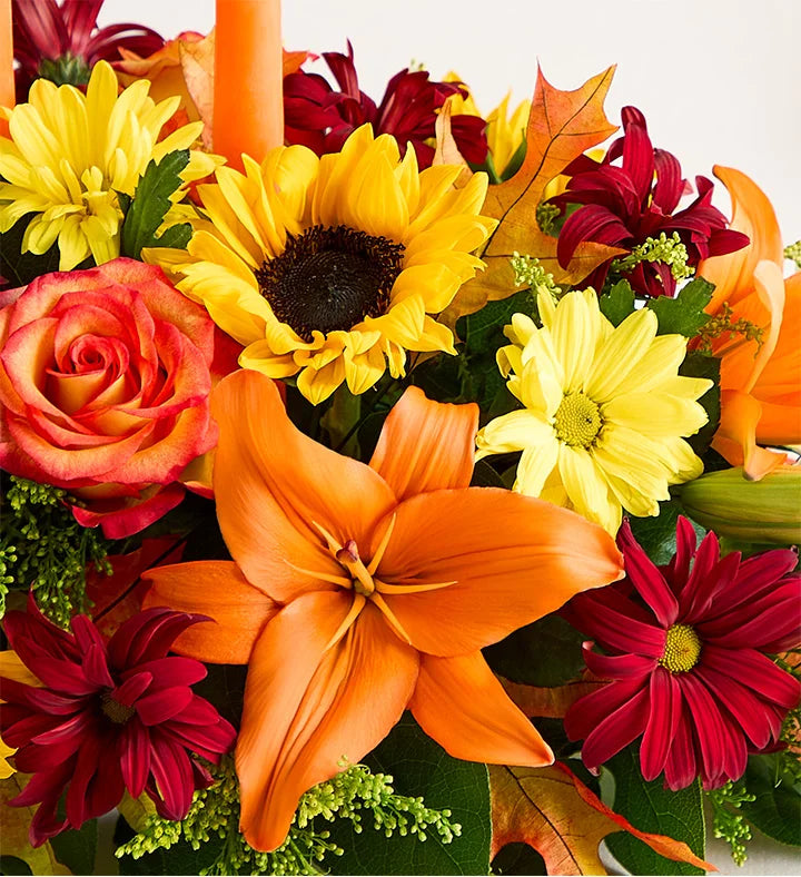 Fields of Europe for Fall Centerpiece, Bouquet of colorful flowers including sunflowers, roses, and lilies on a white background