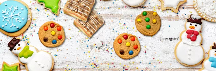Assorted Christmas cookies decorated with icing, candy, and festive holiday designs.