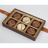 Box of chocolates with a brown and gold design on a white background