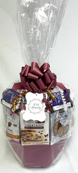 Gift basket with a large bow on a white background