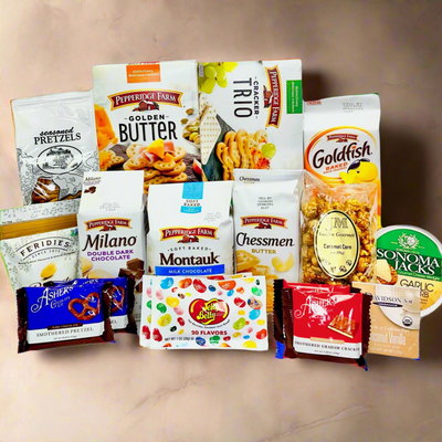 Assorted snack packages on a wooden surface with a gray background Assorted snack packages on a wooden surface with a gray background